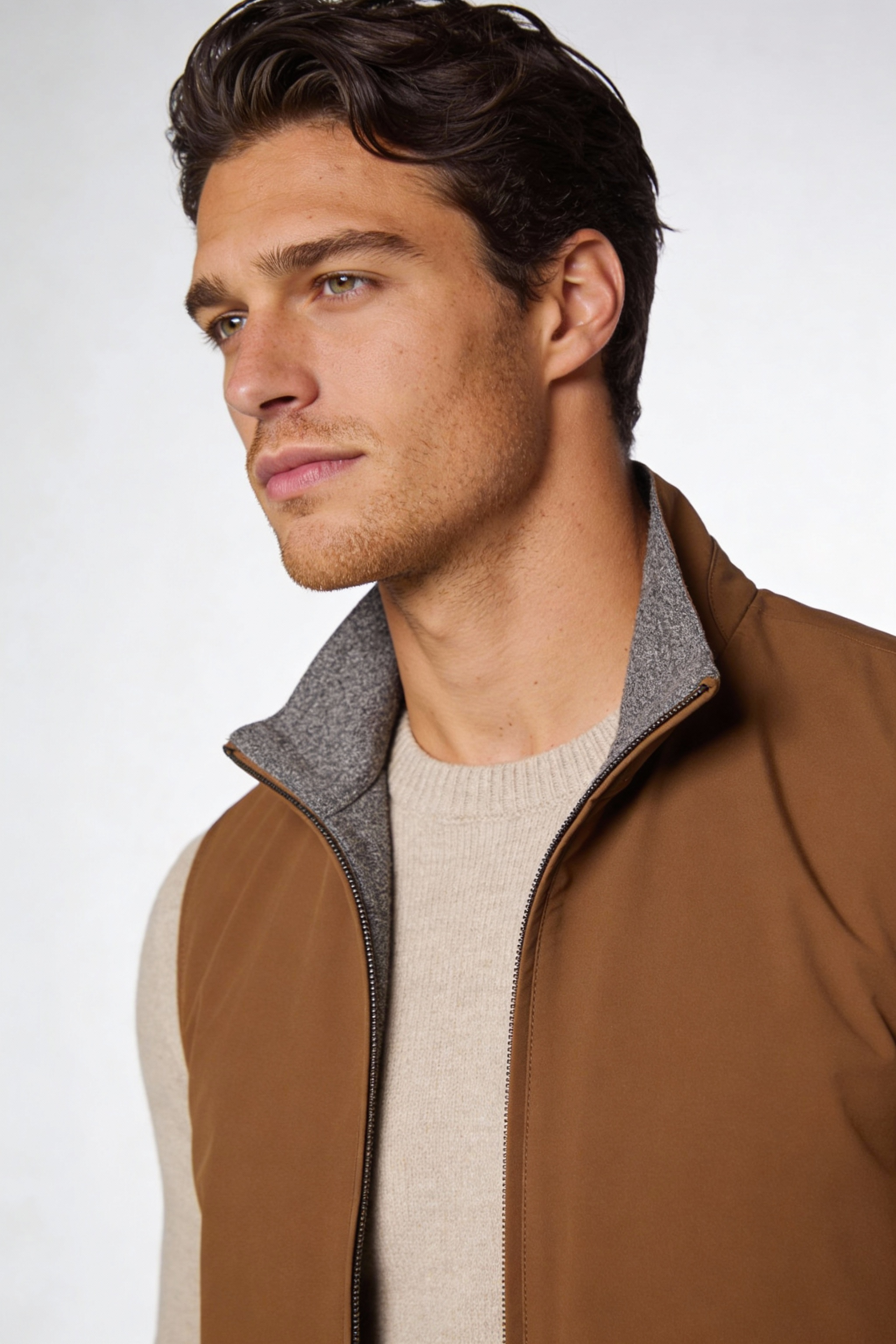 Men wearing a premium reversible lightweight vest with a clean, tailored fit, designed for versatile everyday layering.