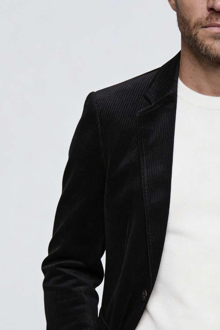 Lavencio Men’s slim fit black corduroy blazer with notch lapel and two-button closure close-up