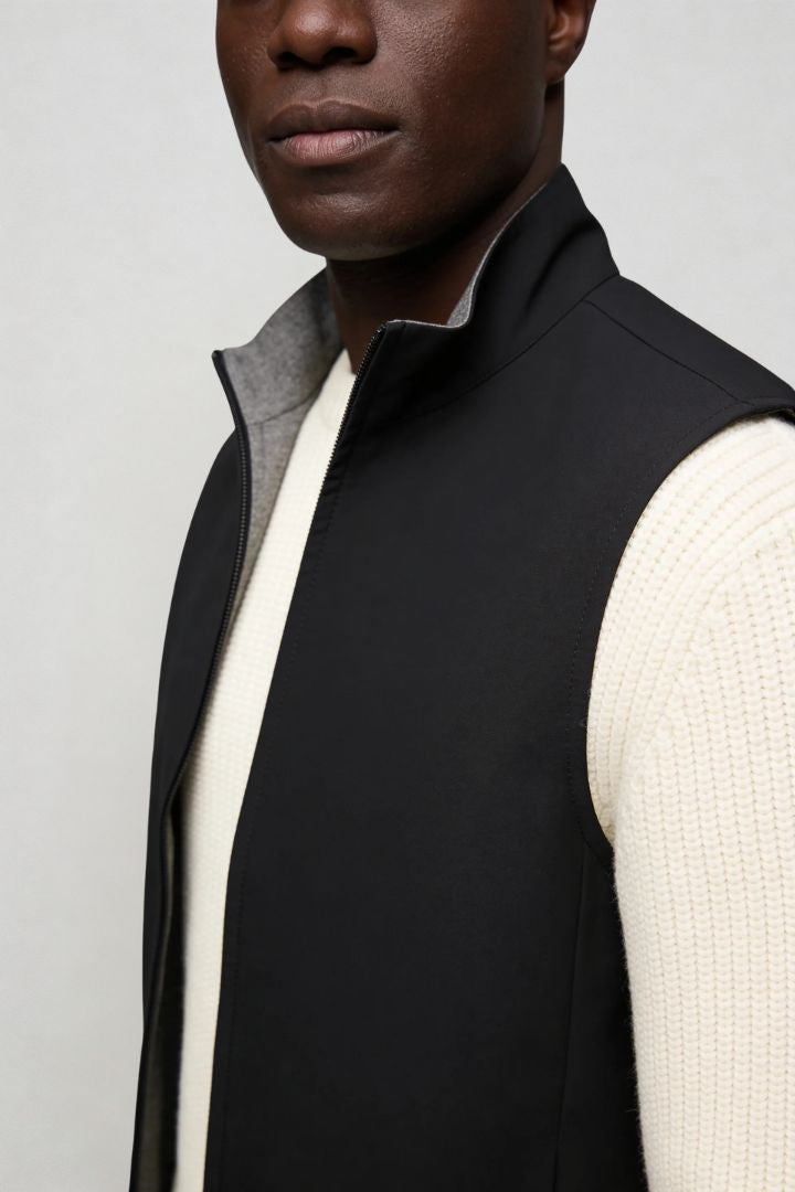 Men’s slim fit reversible lightweight zip vest for smart casual layering black close up