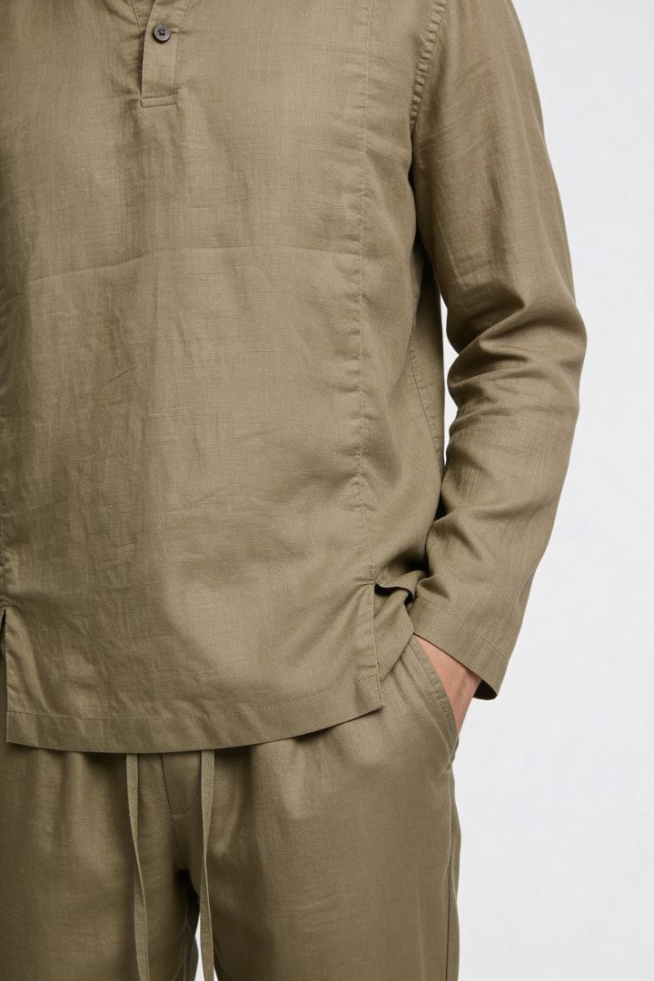 Men’s sandstone khaki linen polo shirt and linen pants summer outfit set with relaxed tailored fit close-up