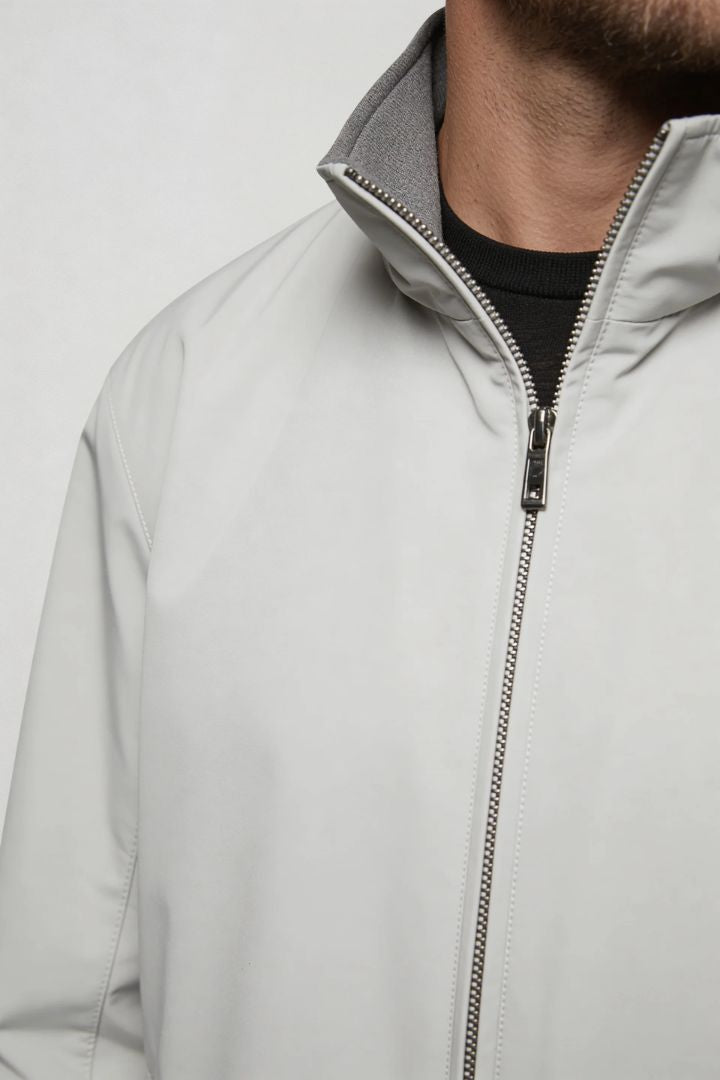 Men’s lightweight reversible zip up jacket with slim fit modern casual design close up