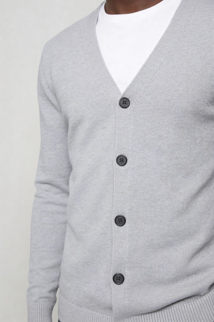 men’s light gray wool V-neck cardigan close-up