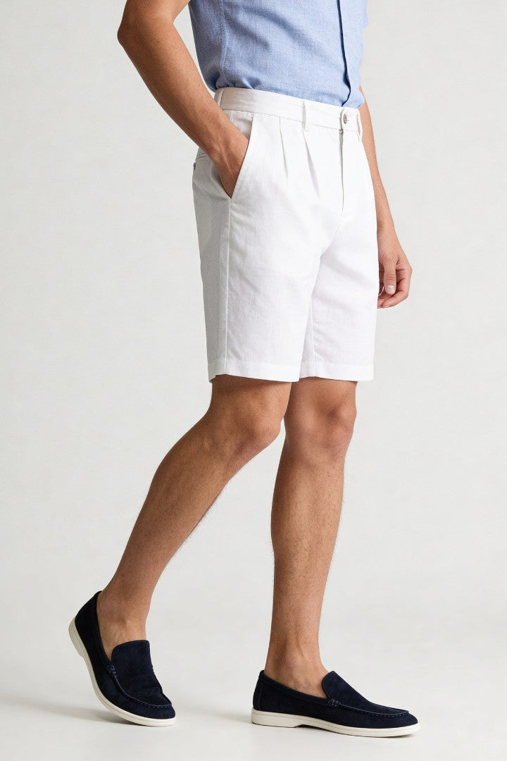 Men’s white pleated linen shorts in breathable lyocell linen blend with tailored summer fit side view