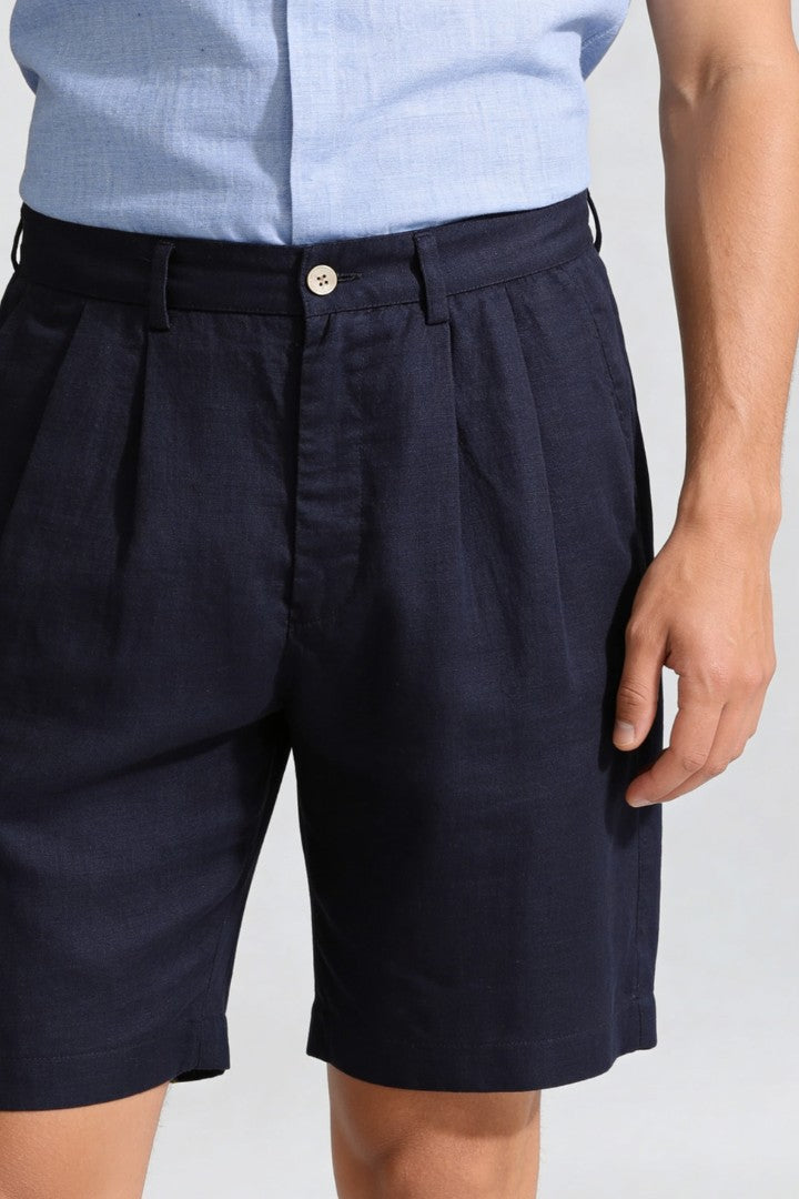 Men’s navy pleated linen shorts in breathable lyocell linen blend with tailored summer fit close-up