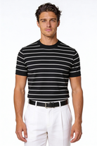 Man wearing the Blake Striped Lyocell T-Shirt with a clean striped design and lightweight fabric in a studio setting.