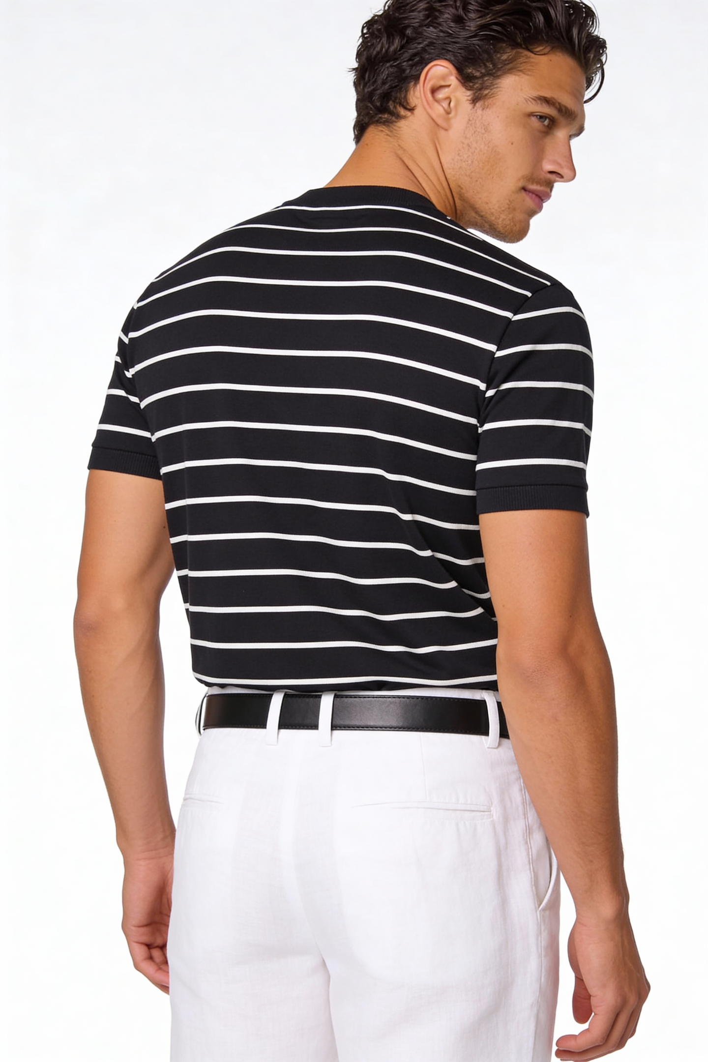 Man wearing the Blake Striped Lyocell T-Shirt with a clean striped design and lightweight fabric in a studio setting.