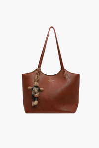 Luna women’s faux-leather shoulder tote bag in chestnut brown with zip-top and gold hardware on white background