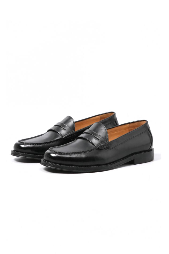 Premium men’s leather penny loafers with classic slip-on silhouette and refined stitching detail black