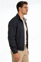 Men wearing the Harlan Lightweight Reversible Jacket with a clean, tailored fit and minimalist design on a studio background.