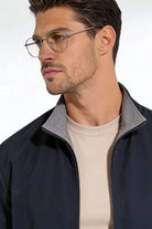 Men wearing the Harlan Lightweight Reversible Jacket with a clean, tailored fit and minimalist design on a studio background.