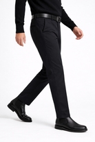 Modal posing with a black tailored stretch trouser of Lavencio