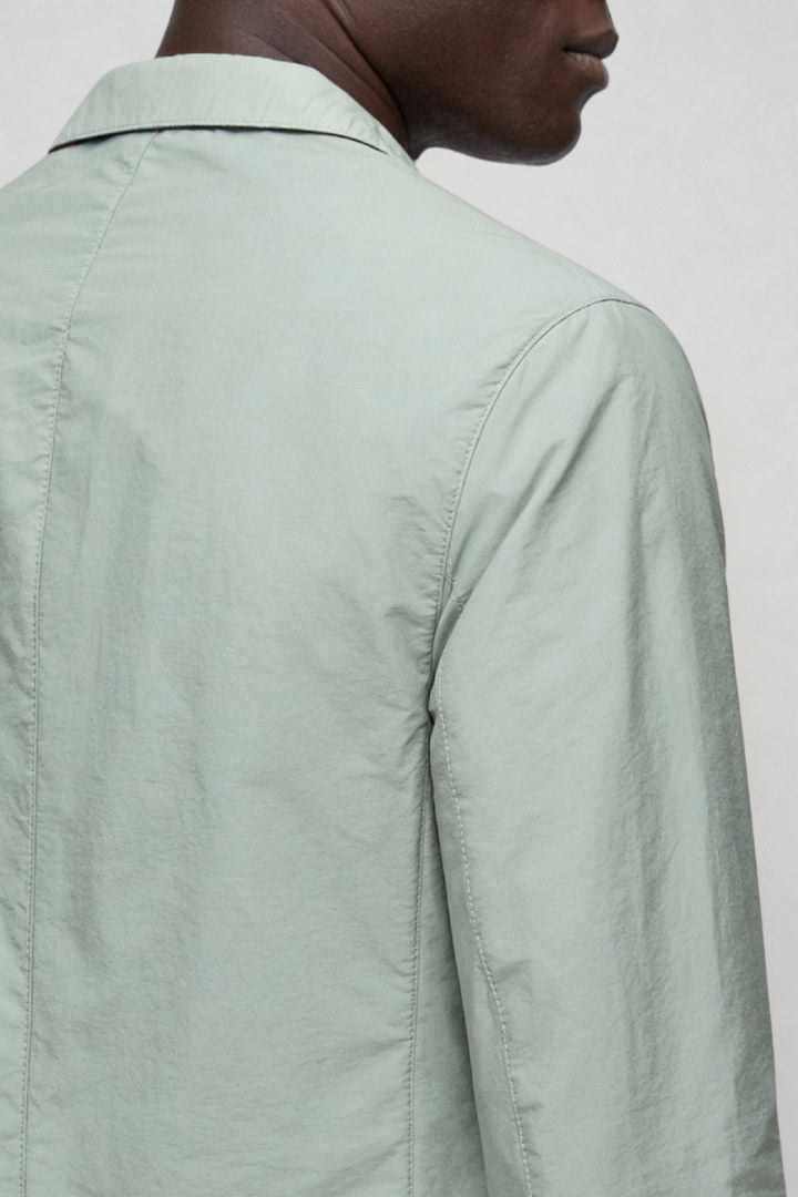 Mens lightweight sage green blazer jacket close-up view