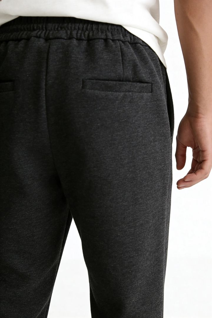 Mens wool blend drawstring trousers charcoal close-up back view